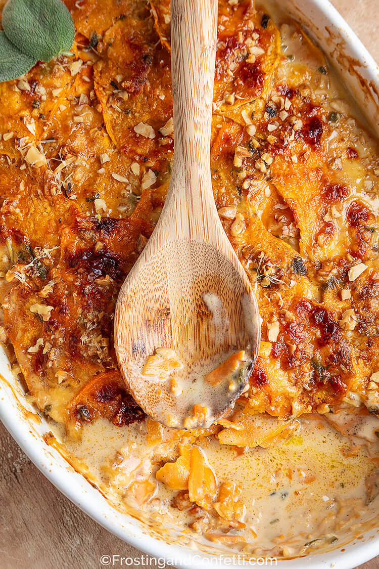 Sweet Potato Gratin with Gouda and Parmesan Scooped from Pan